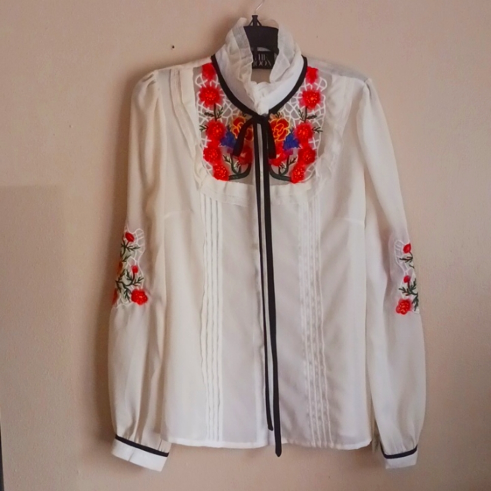 Women's blouse off white with high collar